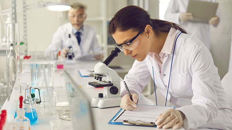 Two scientists working in a laboratory.