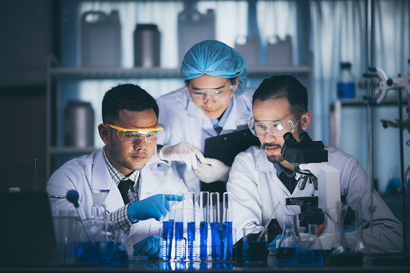 Researchers in a laboratory working together.